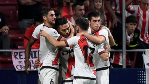 Vallecano celebrate scoring penalty