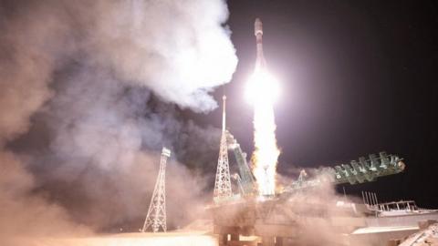 A rocket booster with satellites of OneWeb firm blasts off from a launchpad at the Baikonur Cosmodrome
