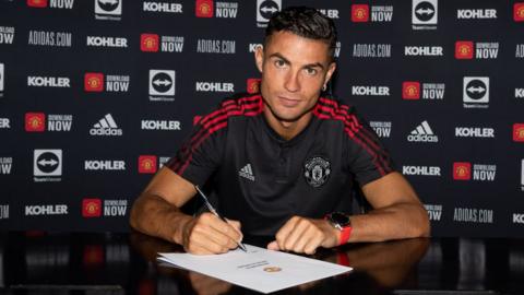 Cristiano Ronaldo signing for Manchester United