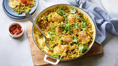 A large pot of chicken pilau.