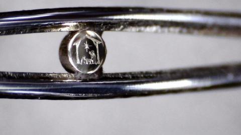 Nativity scene in the eye of a needle