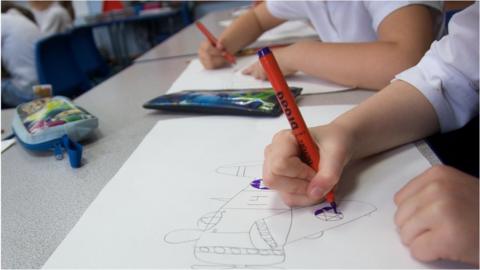 A school pupil working