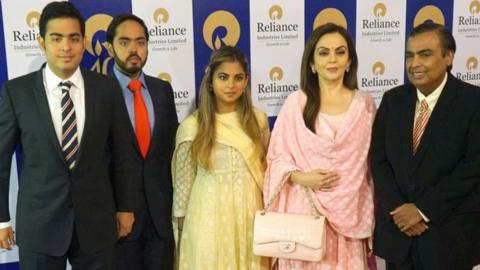 Aakash Ambani, Anant Ambani, Isha Ambani, Nita Ambani and RIL Chairman Mukesh Ambani pose for a group photo before the 40th AGM of Reliance Industries Limited at Matoshree Hall on July 21, 2017 in Mumbai, India.