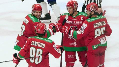 Cardiff Devils players celebrate a goal against Glasgow Clan