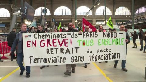 Striking railway workers at Gare du Nord station in Paris