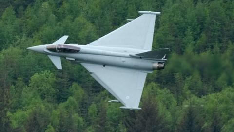 RAF Typhoon flies over the Derwent Dam