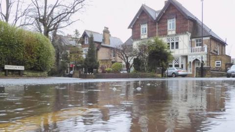 Flooded street in Harrogate after heavy rain. Picture by BBC Weather Watcher Bradley Baldwin