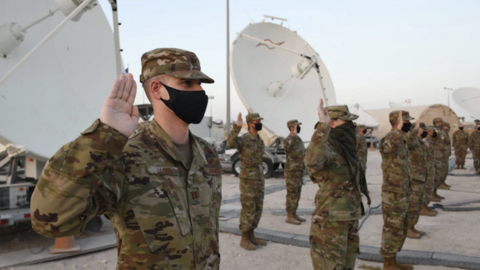 Troops take the oath in Qatar earlier this month