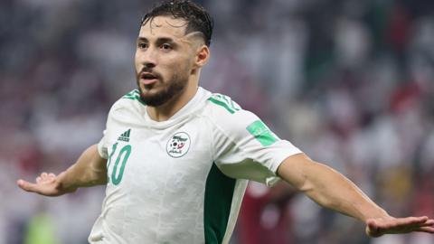 Algeria's Youcef Belaili celebrates his winner against Qatar