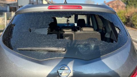 The back window of her vehicle was smashed in the early hours of Sunday morning