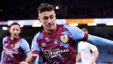 Burnley defender Matt Lowton has joined Huddersfield Town on loan