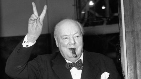 Winston Churchill giving V-for-victory sign