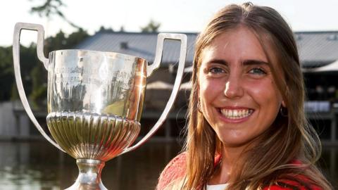 Arozamena is pictured holding the European Ladies' Amateur Championship trophy