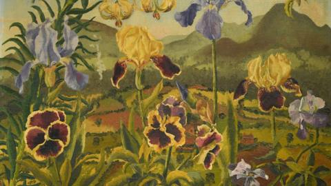 A painting shows flowers in the foreground, they are different shades of cream and purple. In the background there are large green hills and fields, separated by rows for dark green bushes.
