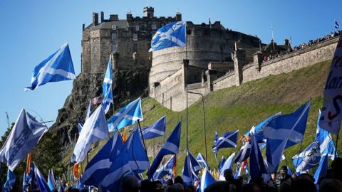 Flags and marchers at Edinburgh Castle