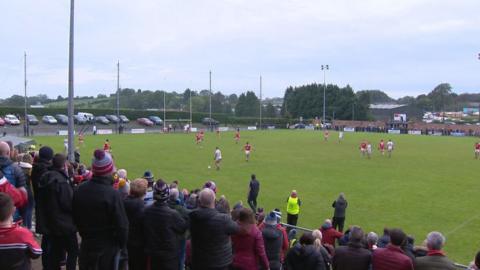 Crowds at the Derry GAA final, seen from behind