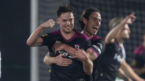 George Hughes of Colwyn Bay FC celebrates his sides goal during the JD Cymru Premier game between The New Saints and Colwyn Bay at the Park Hall Stadium in Oswestry.