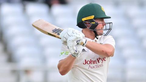 Nottinghamshire opener Ben Slater celebrates his century against Middlesex - he finished on 140