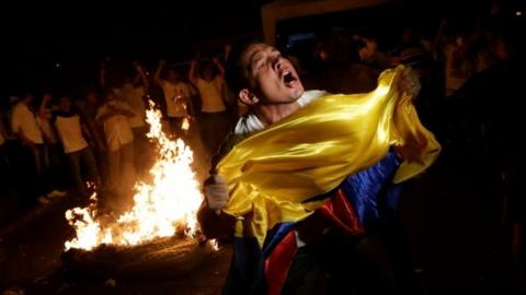 Supporters of Ecuadorean presidential candidate Guillermo Lasso demonstrate during national election day in Guayaquil, Ecuador, April 2, 2017.