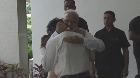 Modi hugs Sivan at ISRO