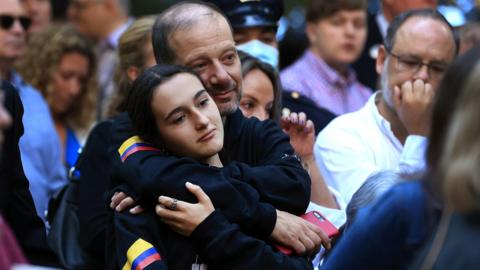 Family members and loved ones of victims attend 9/11 memorial in New York.
