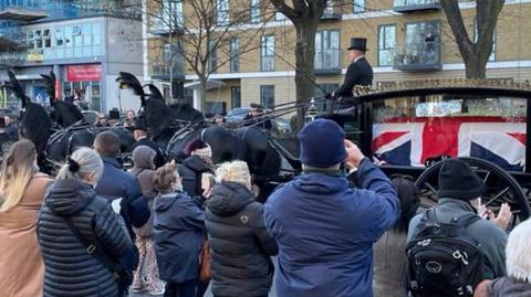 A funeral service is held for the Southend West MP, who was stabbed to death in October.