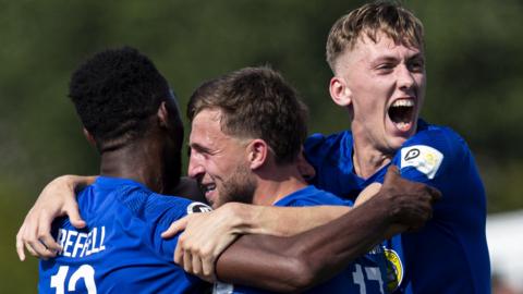 Penybont players celebrate a goal against Bala Town