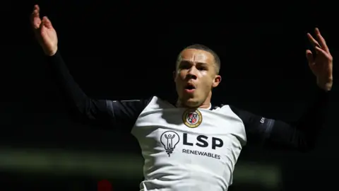 Marcus Ifill celebrates