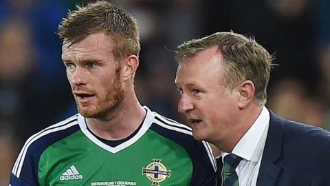 Michael O'Neill gives instructions to Chris Brunt during Northern Ireland's World Cup qualifier against the Czech Republic in September 2017