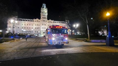 A firefighter truck is parked in front of the National Assembly of Quebec, in Quebec City, early on 1 November 2020