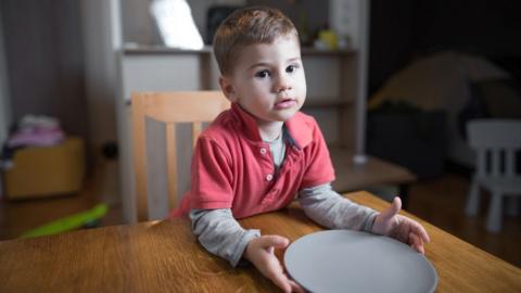 boy with empty plate