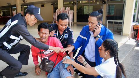 A bomb blast victim is treated in Hua Hin, 12 Aug 15