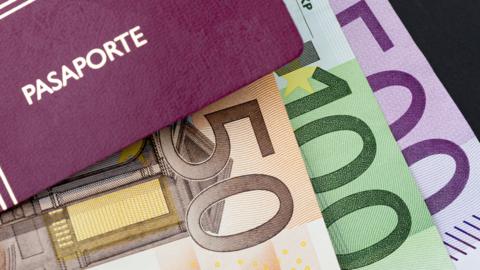 An EU passport and euro notes