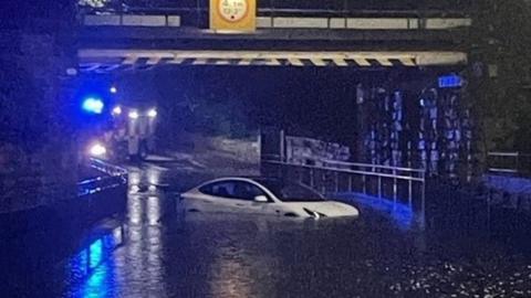 Car stuck in flood water in Tamworth Road, Ashby de la Zouch, Leicestershire