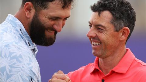 Jon Rahm and Rory McIlroy shaking hands in November 2023