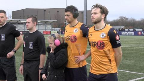 Slough Town FC player Josh Jackman with Roseanne in team line up