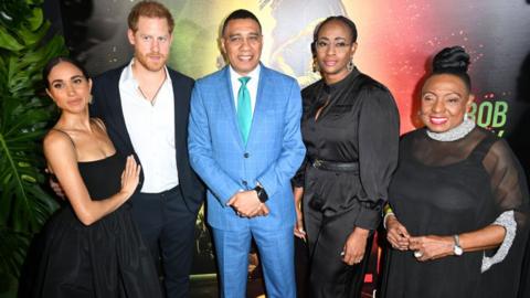 Meghan, Harry and Andrew Holness
