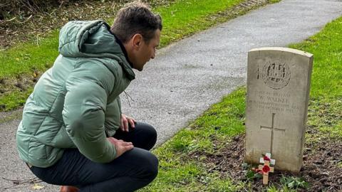 Phil Dowson caring for a war grave