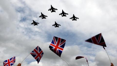 Six Tornado aircrafts and British flags