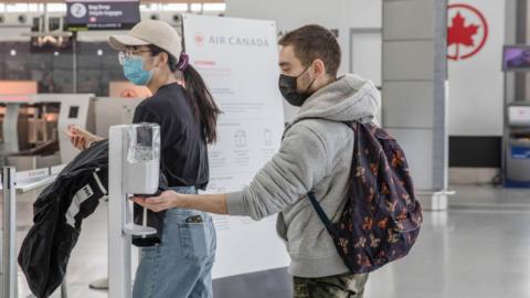 Passengers at Pearson Airport in Toronto