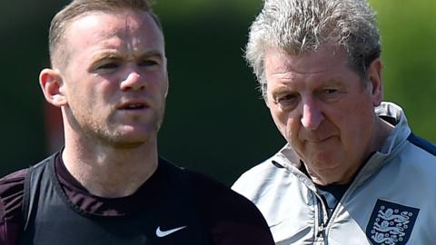 England's Wayne Rooney and Roy Hodgson