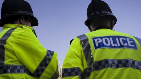 Stock image of two UK police officers