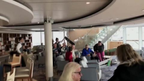 Passengers below deck on board a stricken cruise ship off the Norwegian coast