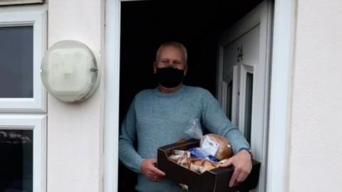 Fisherman with hamper