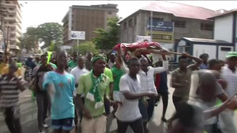 Supporters of Sierra Leone's opposition candidate, Julius Maada Bio, took to the streets of the capital Freetown