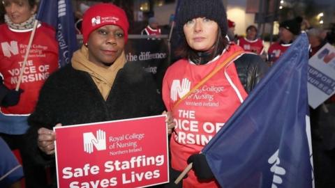 Royal College of Nursing Chief Executive Dame Donna Kinnair (left) on the picket line in Northern Ireland