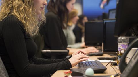 women working at a desk