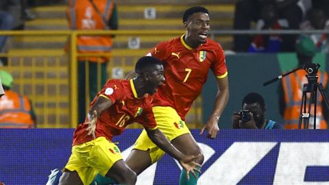 Aguibou Camara celebrates scoring his team's first goal during the Africa Cup of Nations 2024 Group C match between Guinea and Gambia at the Stade Charles Konan Banny in Yamoussoukro