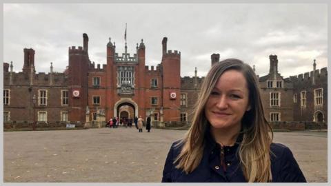 Angela Jansen outside Hampton Court Palace