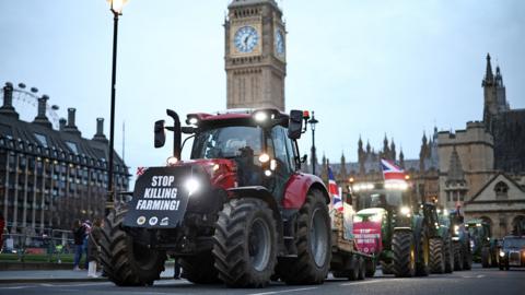 Farmers drive tractors around Parliament Square during the demonstration